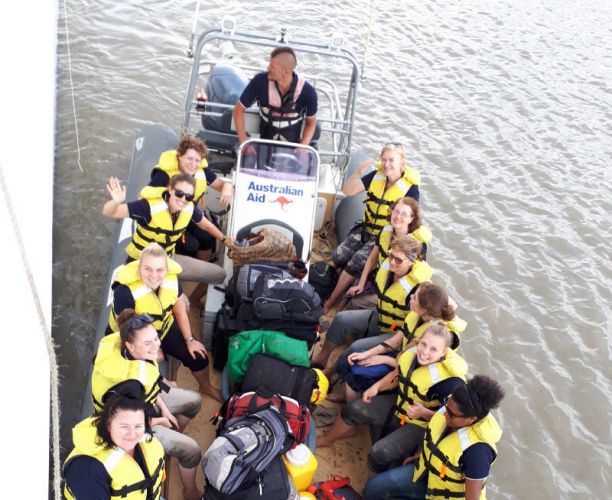Nursing students in a boat to deliver healthcare to remote communities